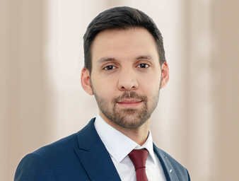 Emre Özbek, Portrait