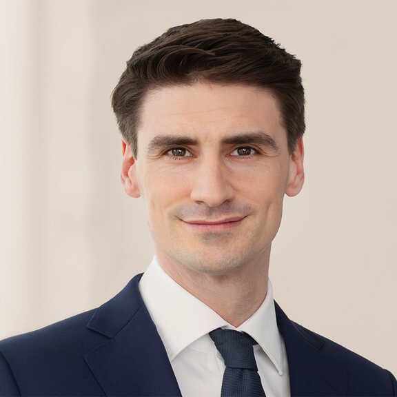 Dr. Manuel Holzmann, Portrait