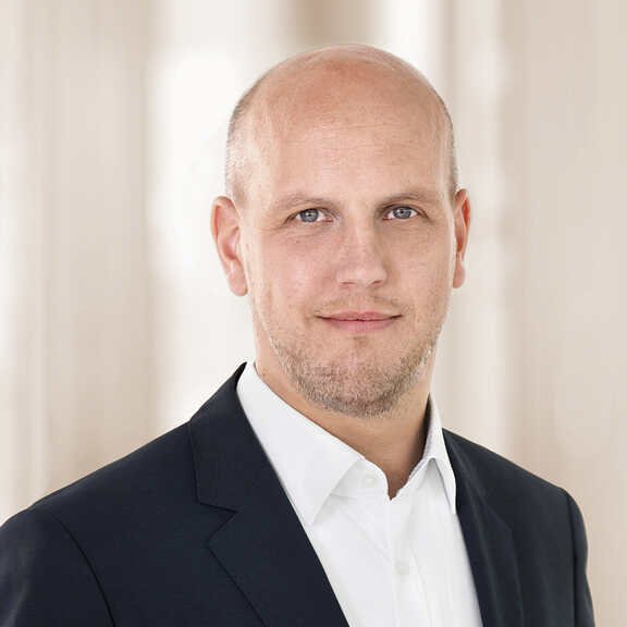 Dr. Oliver Spieker, Portrait