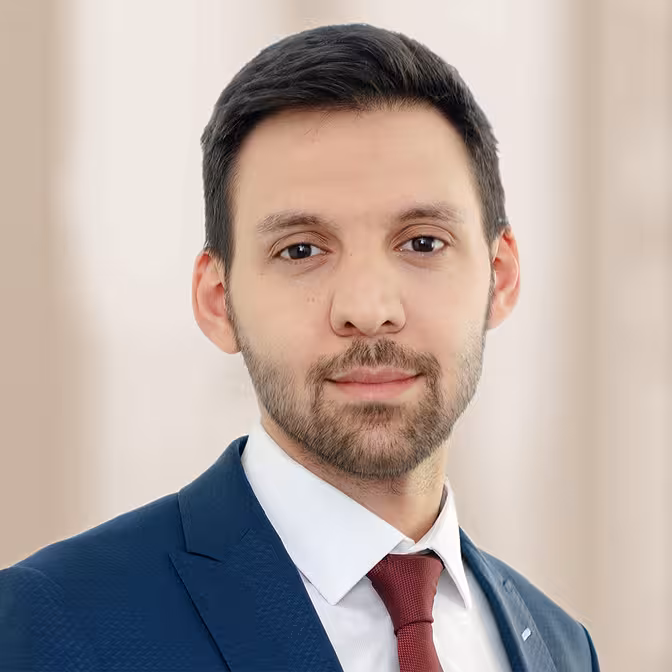 Emre Özbek, Portrait