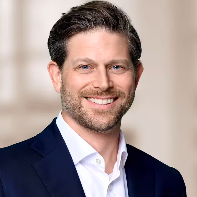 Portrait-Foto von Partner Dennis Hog